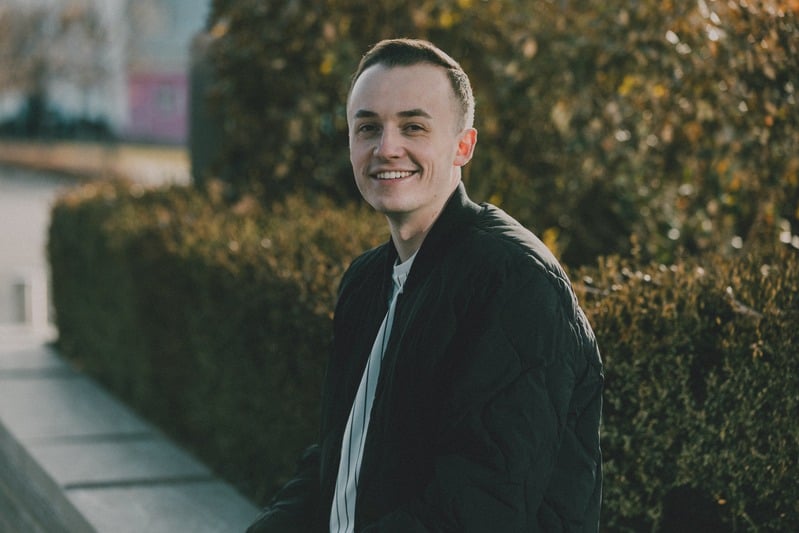 Van Taylor smiling outdoors.